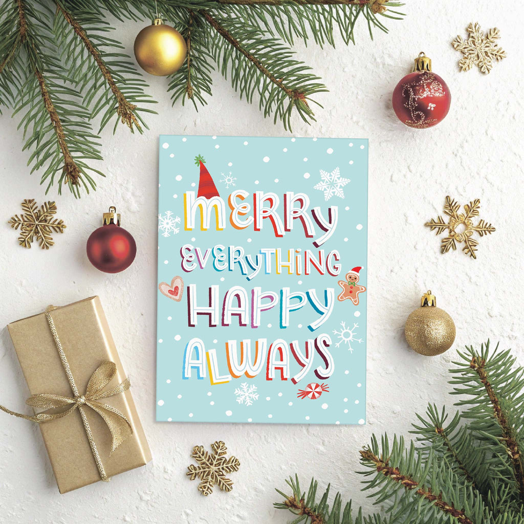 Christmas card with 'Merry Everything Happy Always' text, surrounded by festive decorations on a white background.