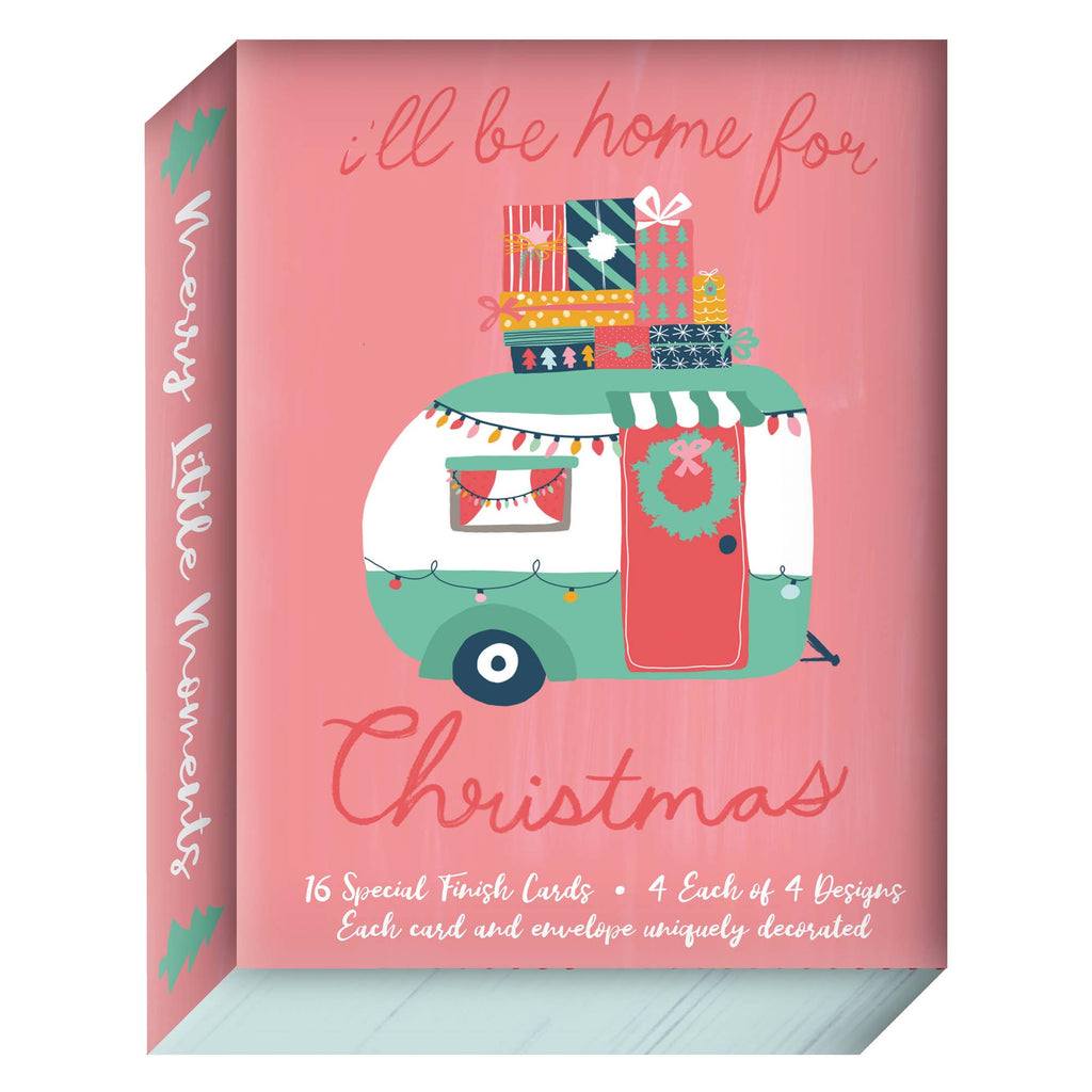 Box of Christmas cards with a camper illustration and text on a pink background