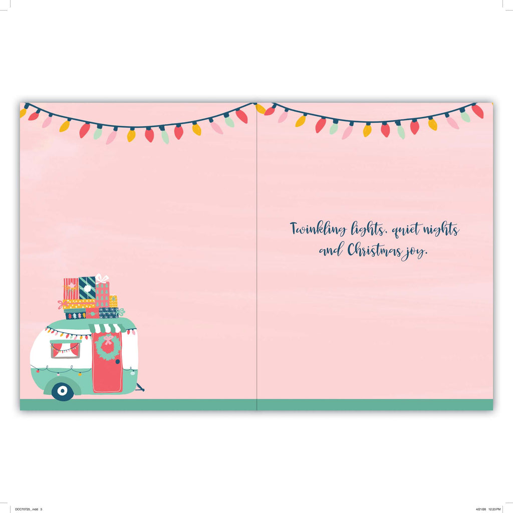 Card with a camper illustration and Christmas lights on a pink background