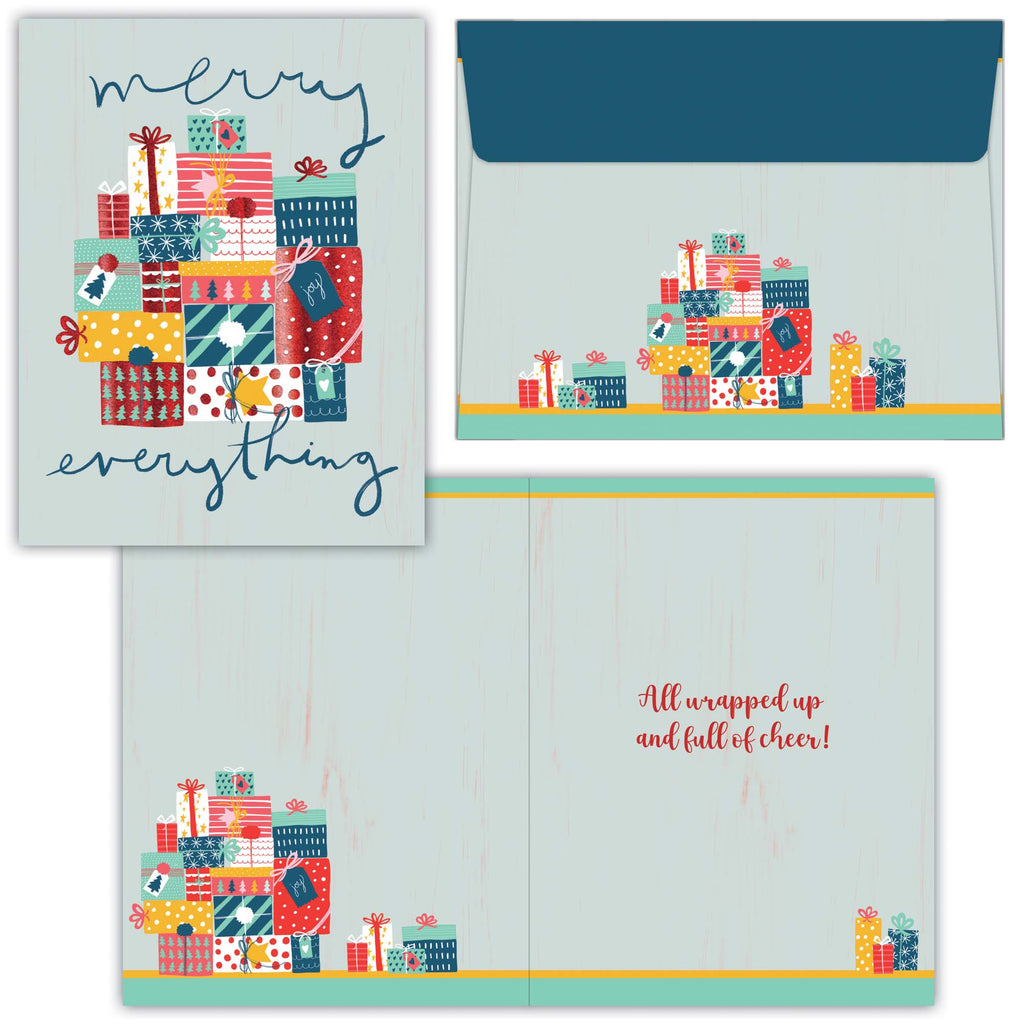 Christmas card with colorful gift box design and matching envelope on a light blue background.
