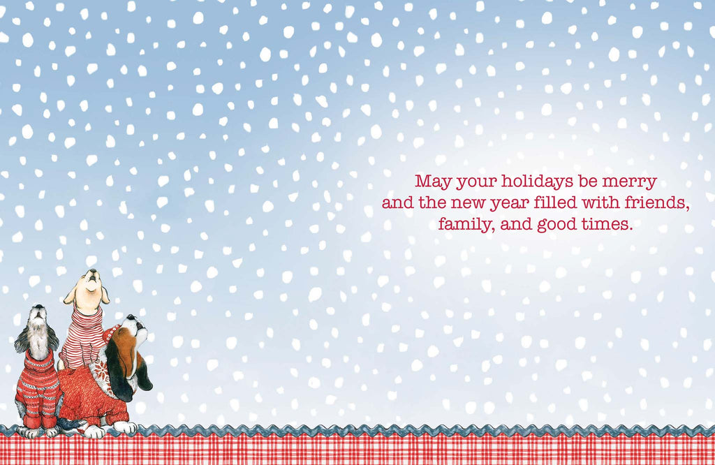 Christmas card with dogs in winter clothing against a snowy background
