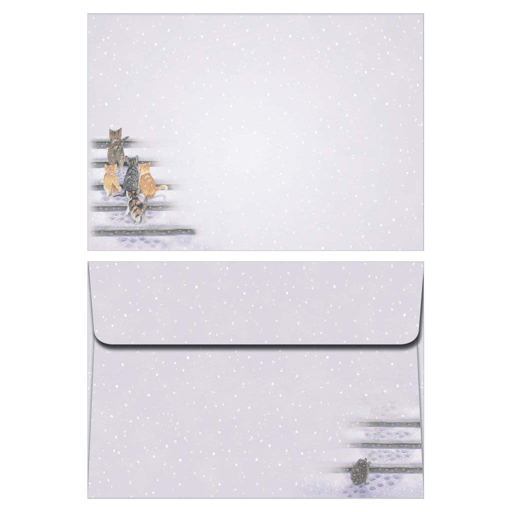 Set of earrings and a matching pouch with polka dot pattern on a white background