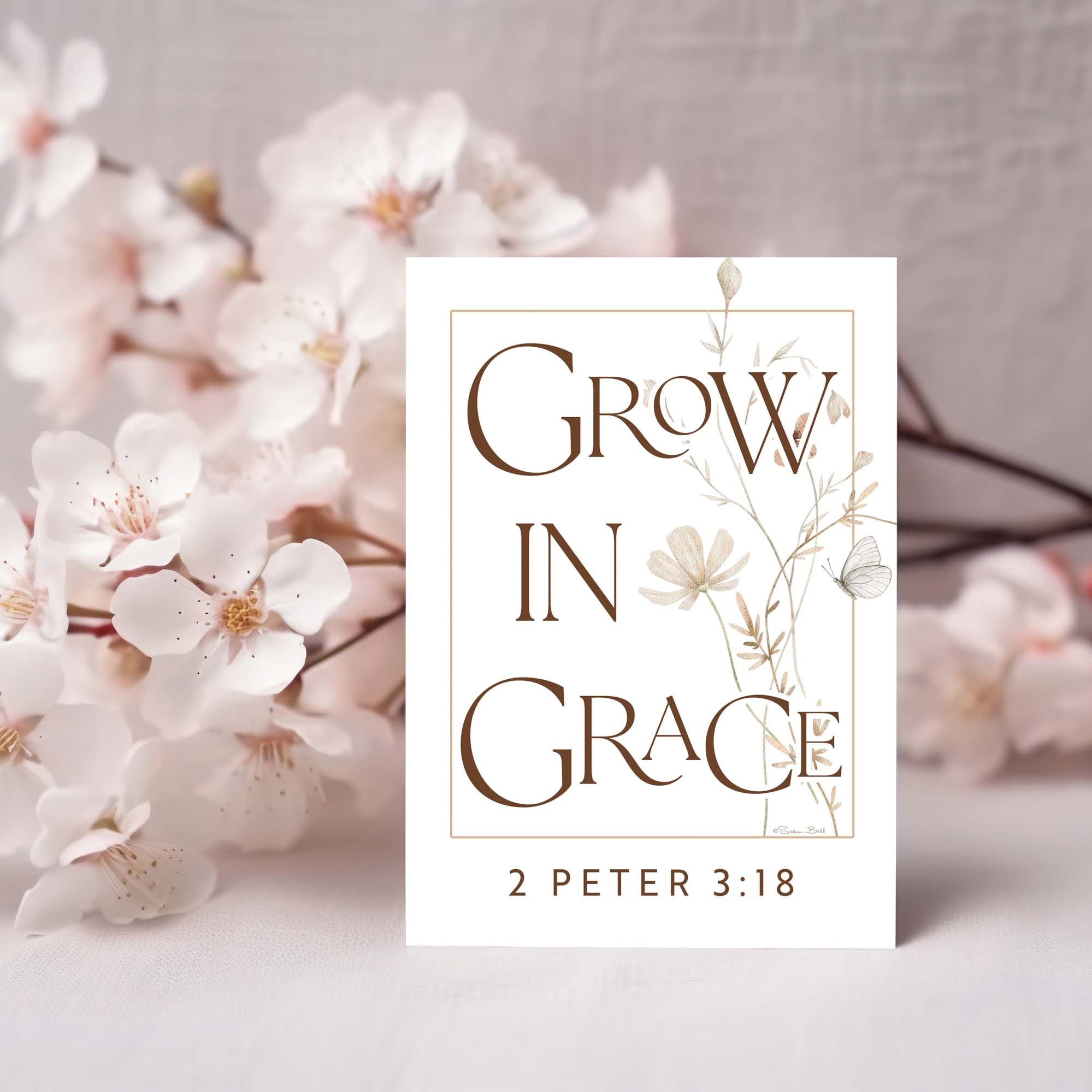 Card with 'Grow in Grace' text and floral design on a soft background