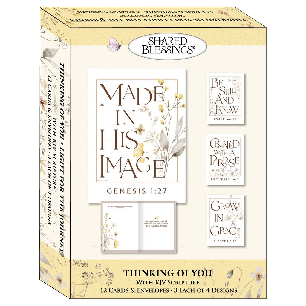 Box of 'Made in His Image' cards with KJV Scripture, featuring floral and text design.