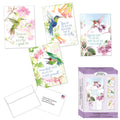 Set of greeting cards with hummingbird designs and motivational quotes, including a box packaging.