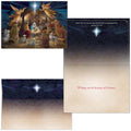 Christmas card with nativity scene and envelope featuring a star in the sky.