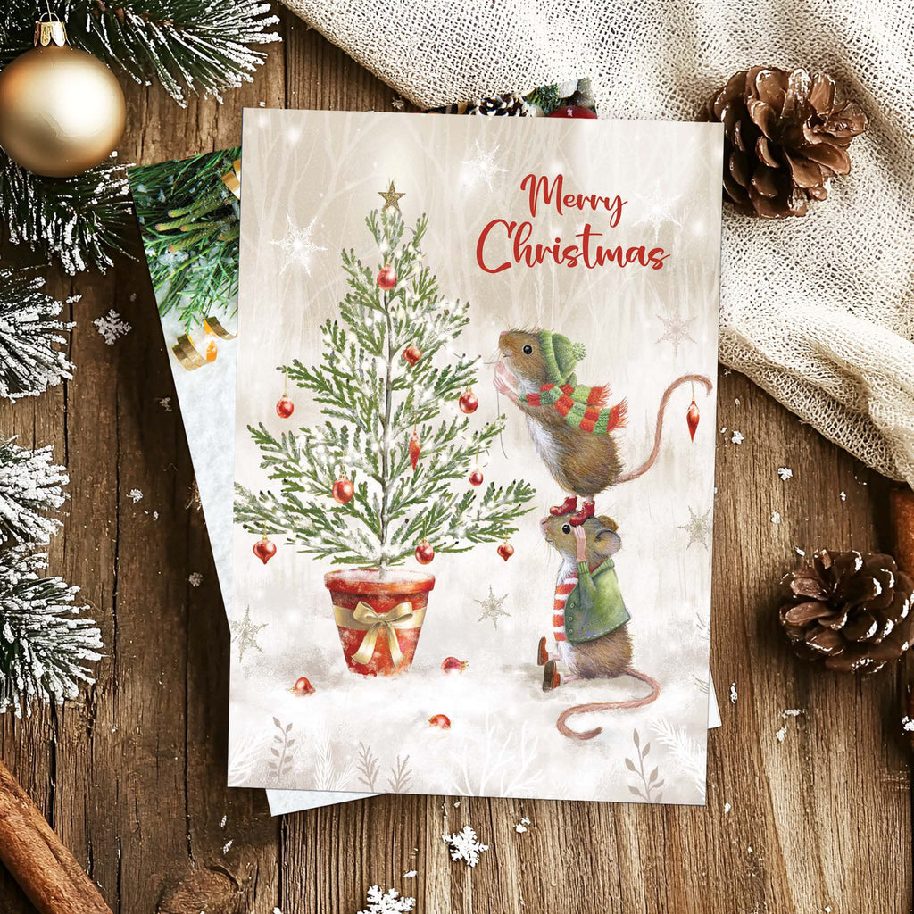 Religious Christmas Card with Mice on Table with Pine Cones and Ornaments
