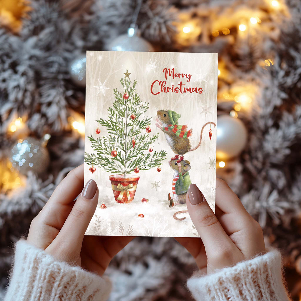 Women holding Christian Christmas Card