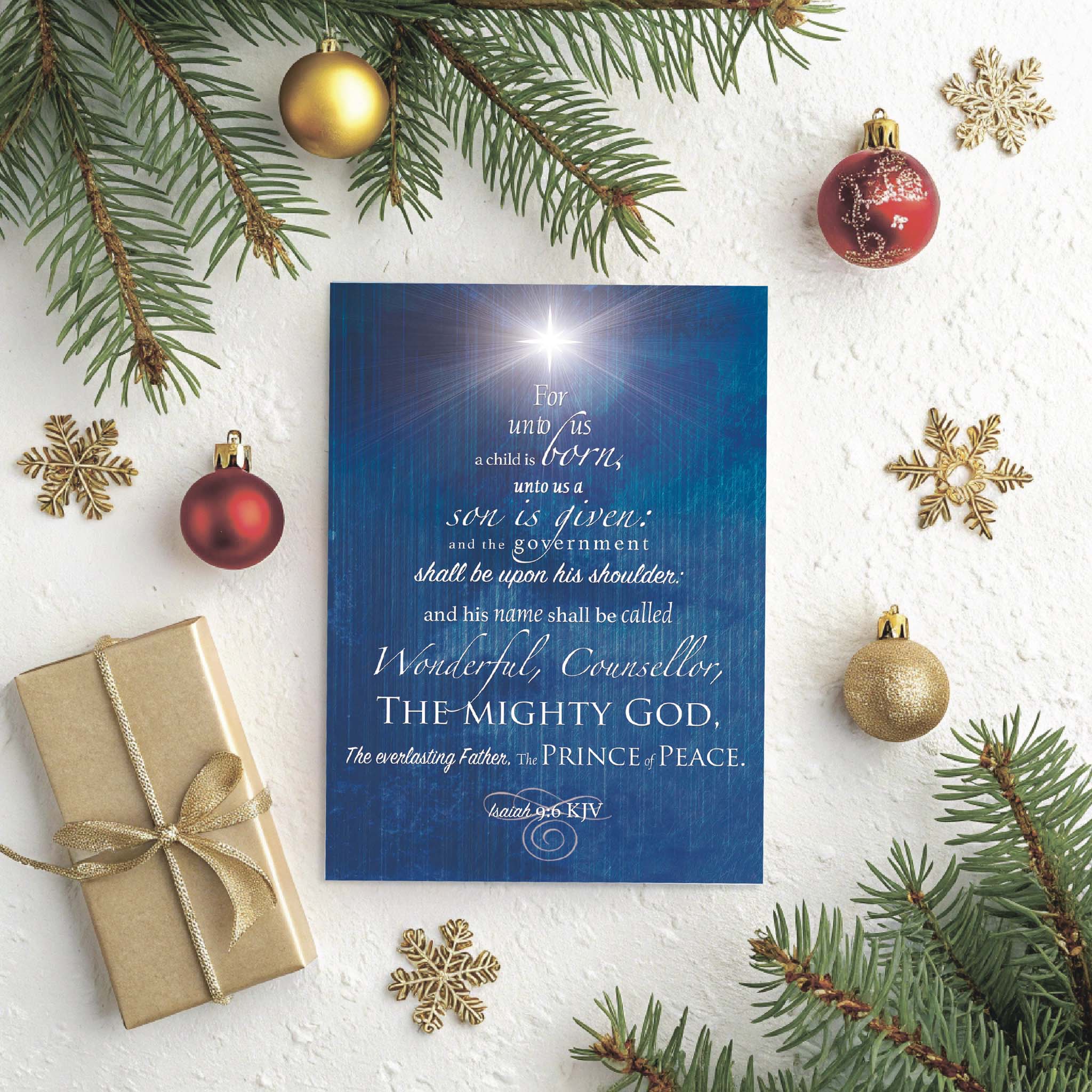 Religious Card on Table with Presents and Ornaments