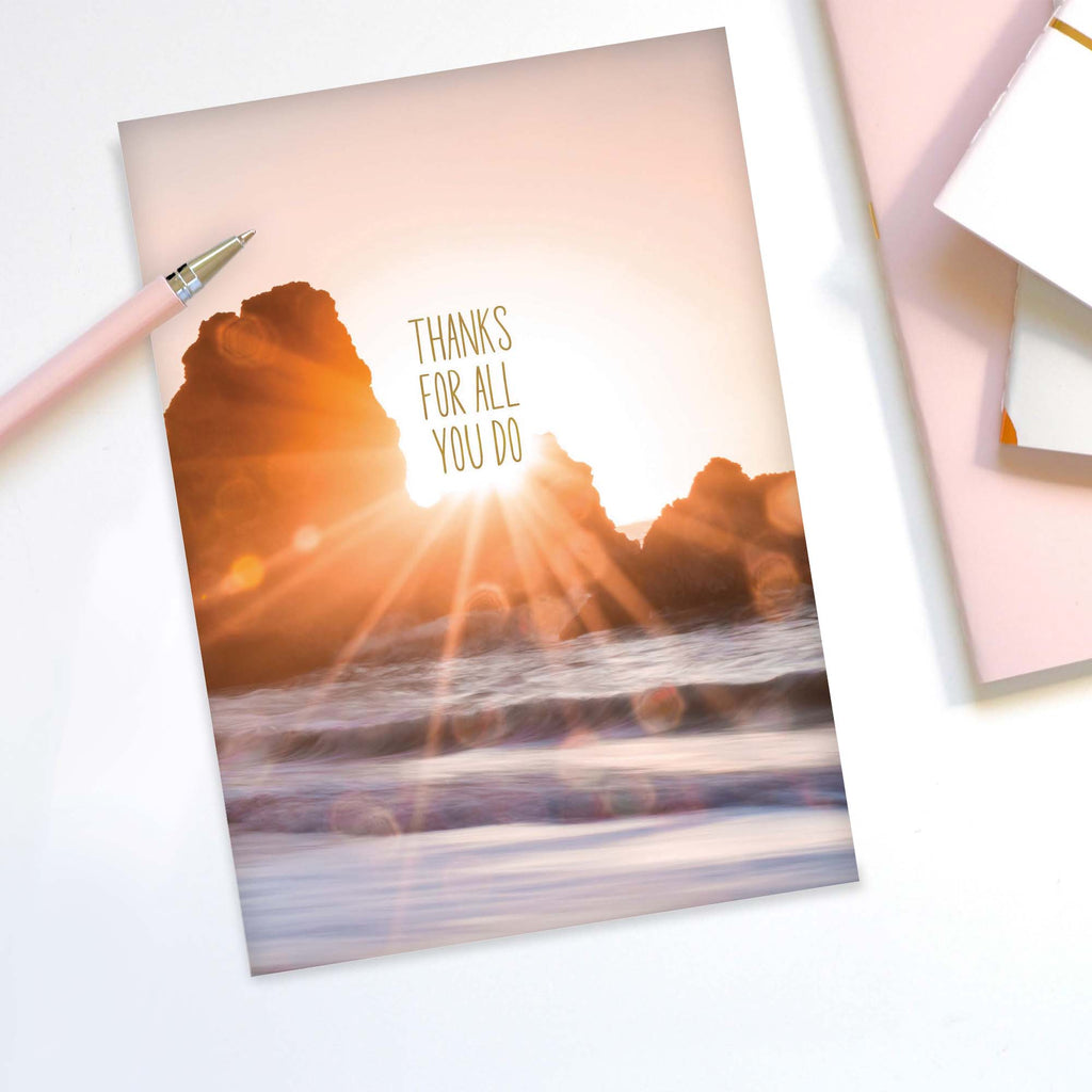 Greeting card with sunset design and 'Thanks for all you do' text on a white background