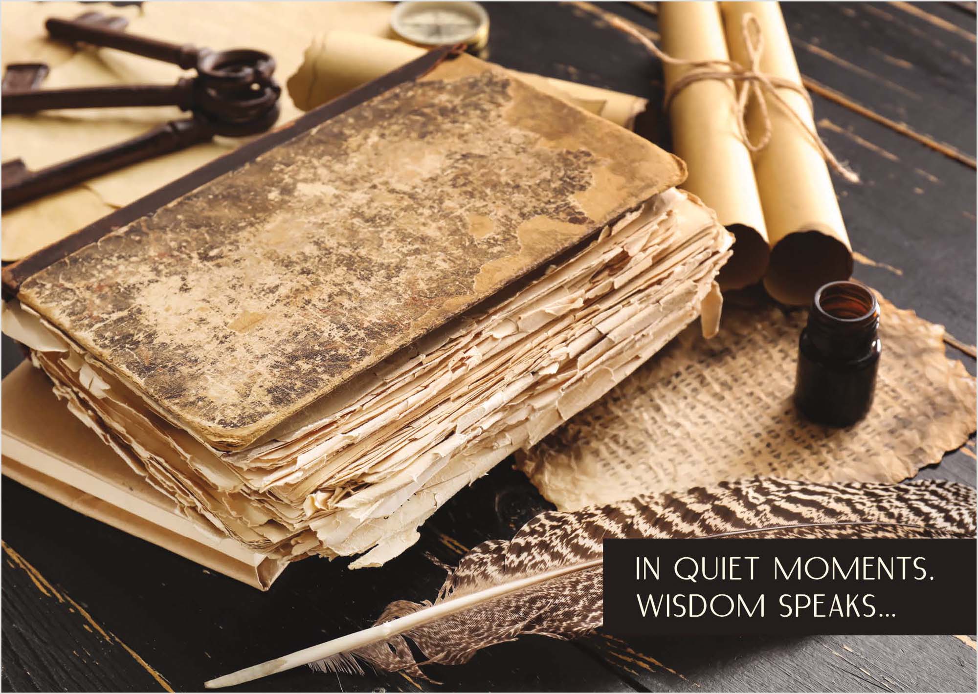 Stack of old books with a feather pen and ink bottle on a wooden surface, with a text overlay.