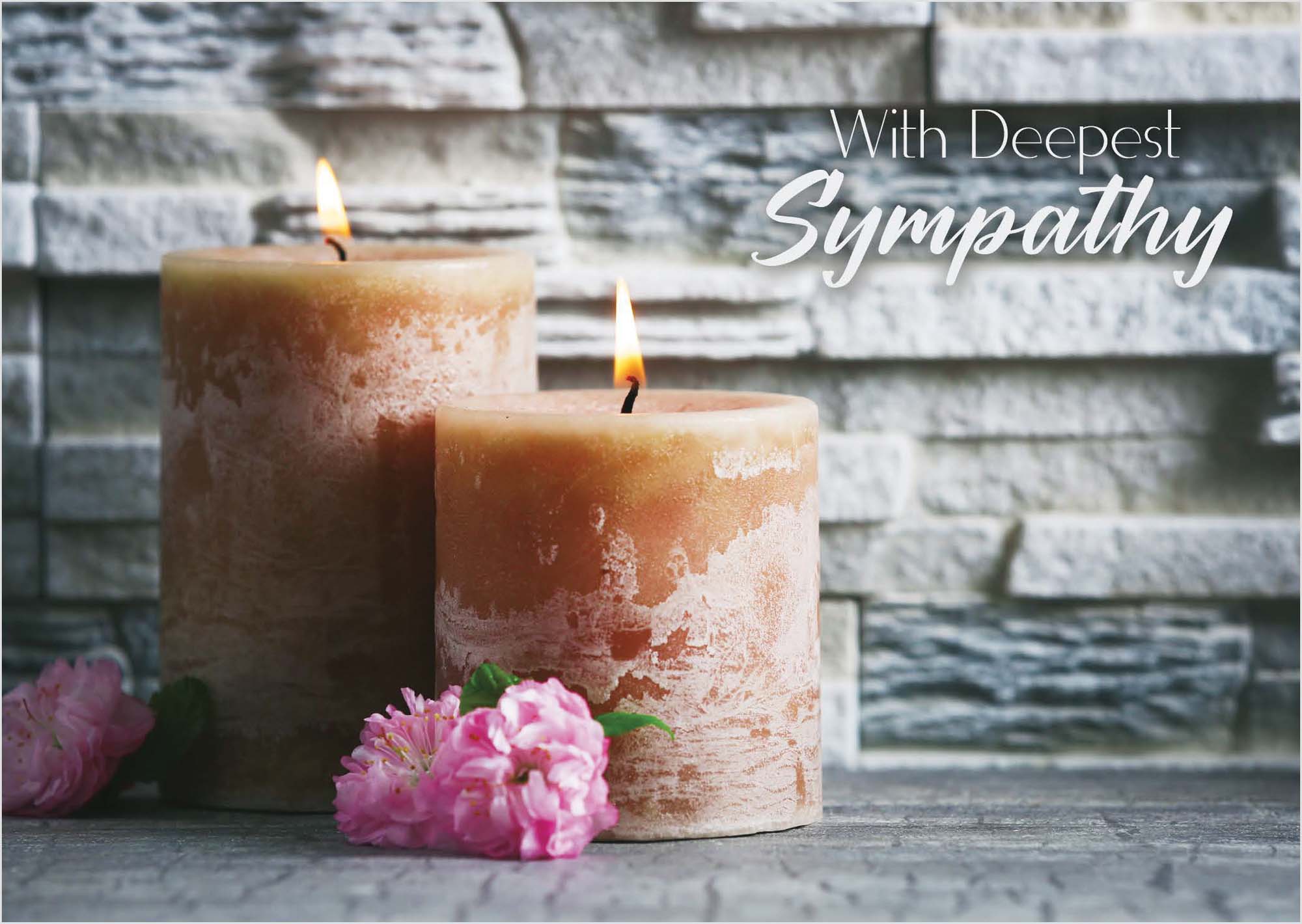 Two lit candles with pink flowers in front of a stone wall, accompanied by 'With Deepest Sympathy' text.