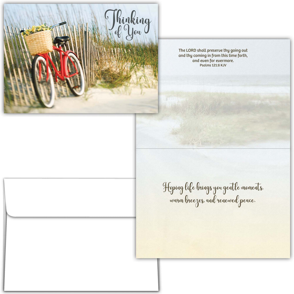 Greeting card with bicycle and dunes design, featuring a message of encouragement.