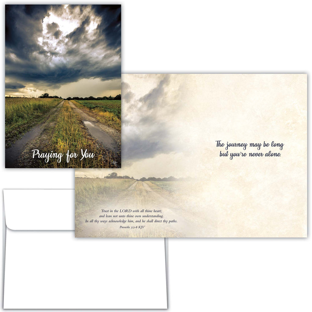 Greeting card with a road through a field and motivational text on a matching envelope.