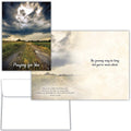 Greeting card with a road through a field and motivational text on a matching envelope.