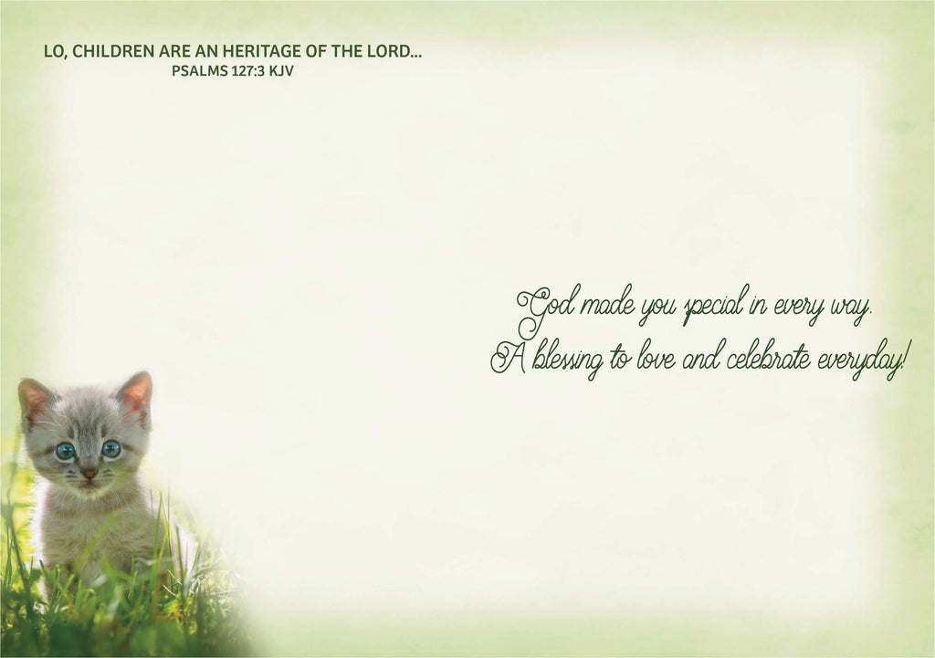 Kitten in grass with inspirational text on a light green background