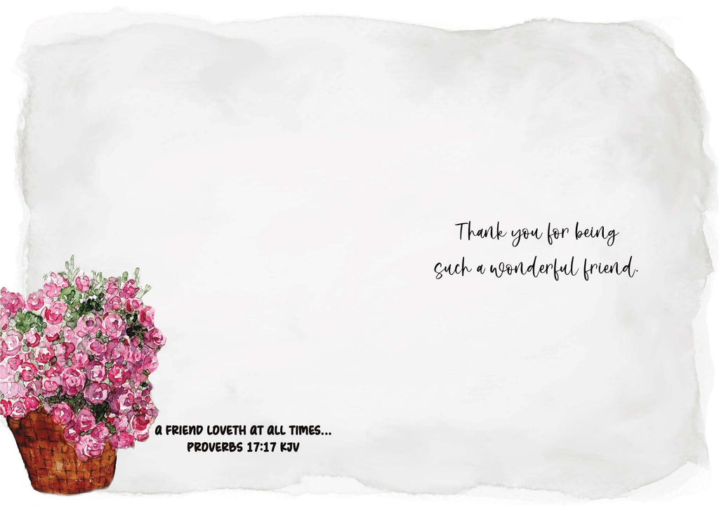 White pillow with pink flowers and text on a white background