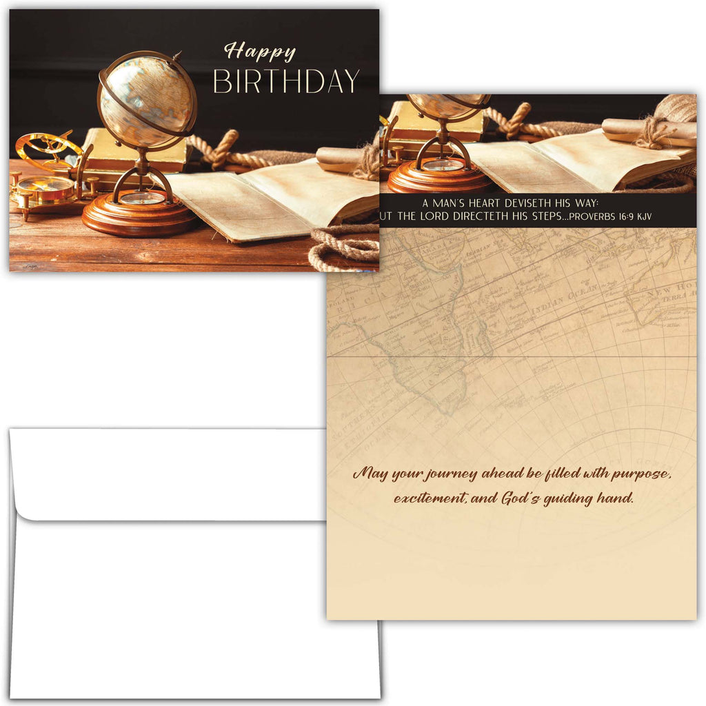 Vintage-themed birthday card with books, globe, and map on a wooden surface.
