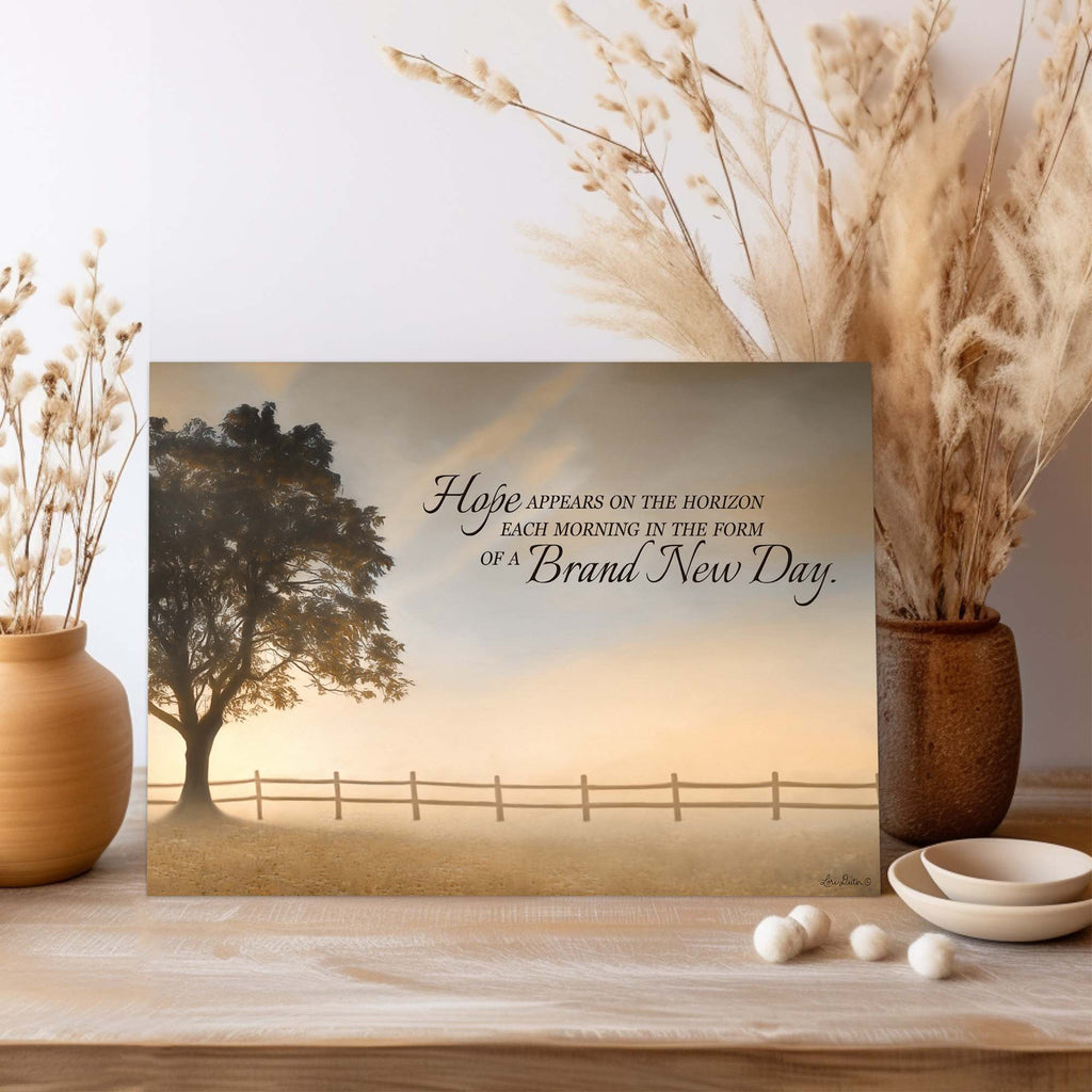 Decorative card with a tree and quote on a wooden surface with decorative elements.