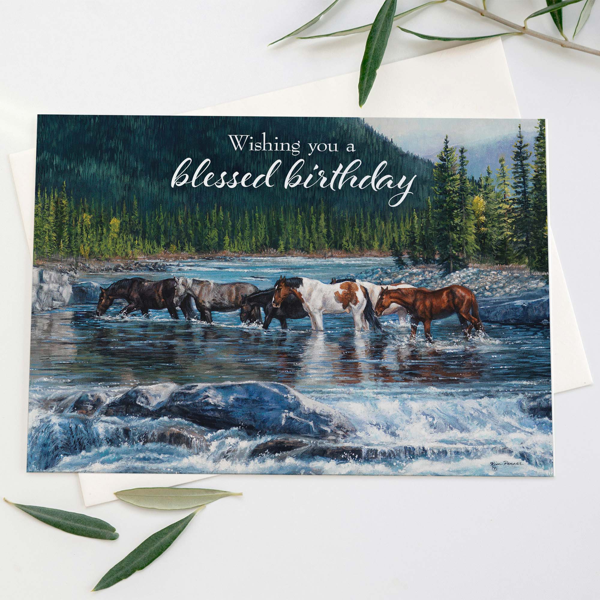 Birthday card with horses crossing a river and 'blessed birthday' text