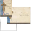 Greeting card with cross design and text on a white background