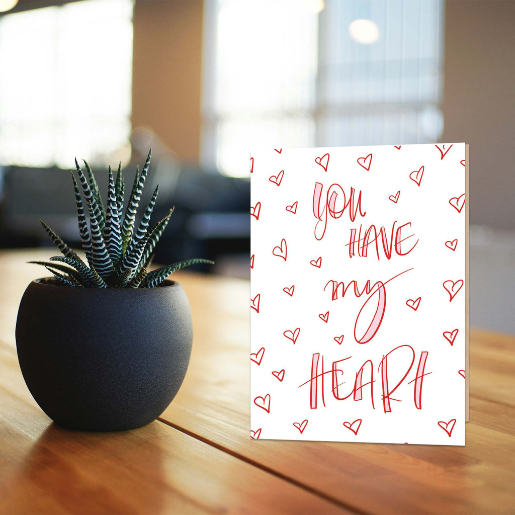 Valentine Card on table with Aloe plant