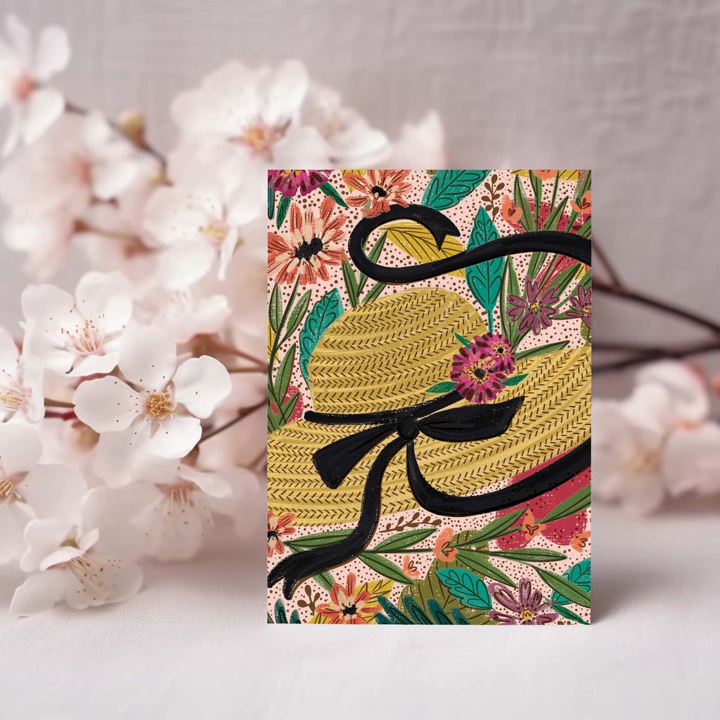 Mother's Day Card with Hat and Flowers in Background