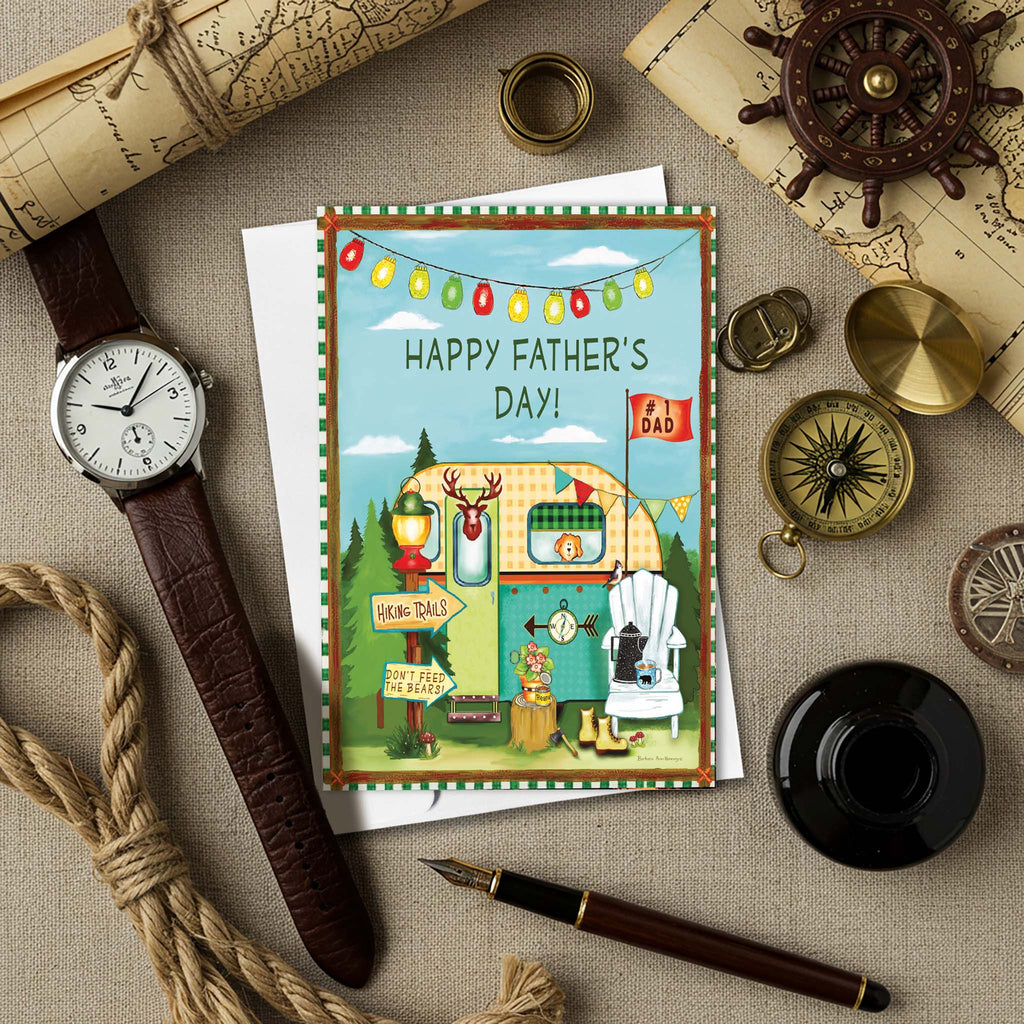 Father's Day card with vintage camper illustration surrounded by nautical-themed items on a textured surface.