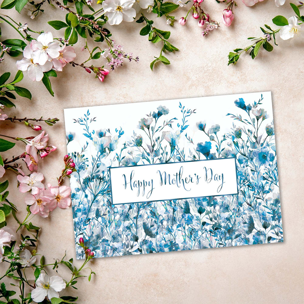 Floral card with 'Happy Mother's Day' text surrounded by flowers on a light background
