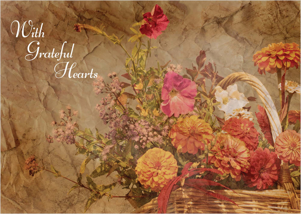 Vintage-style floral arrangement with a basket on a textured stone background, featuring the text 'With Grateful Hearts'.