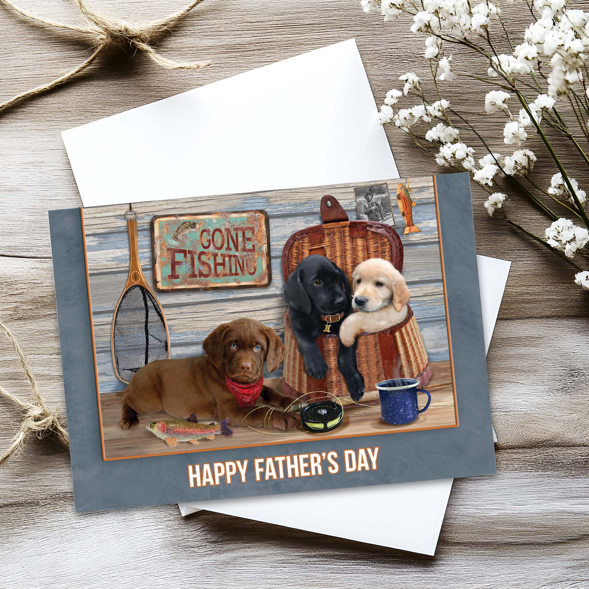 Father's Day card on table with shells and flowers