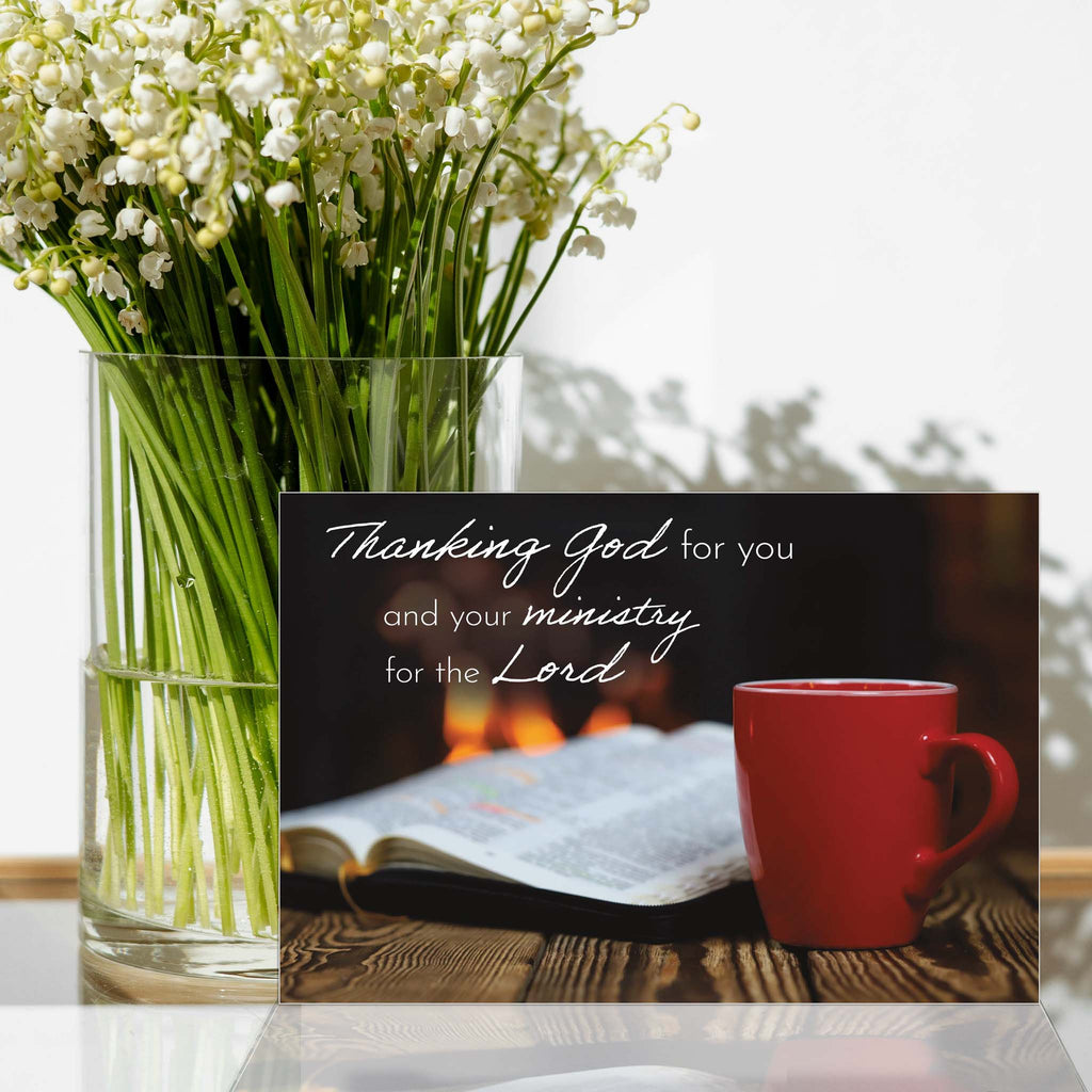 Religious Ministry Card with Bible and Coffee cup on table with flowers